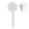 Brosse pour chat poil long blanche avec poils métalliques souples.