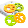 Quatre attrape poils machine à laver en silicone, forme patte de chat.