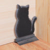 Brosse murale pour chat gris foncé installée dans un angle de mur.