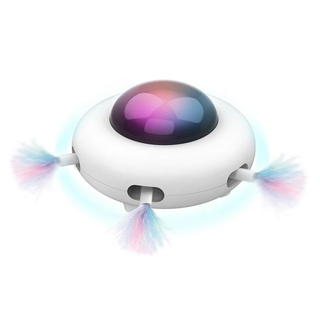 Jouet automatique pour chat blanc avec dôme lumineux et plumes multicolores.