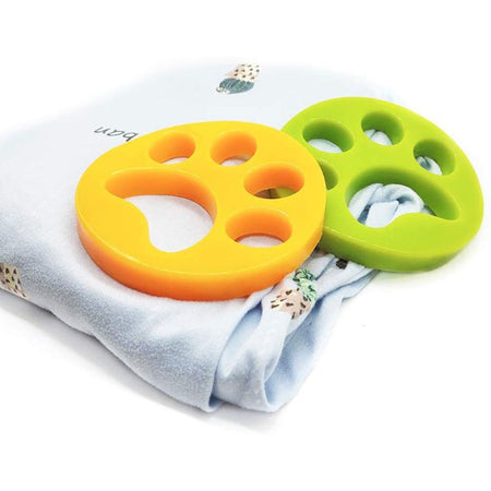 Deux attrape poils machine à laver en silicone, forme patte de chat, idéal pour le linge quotidien.